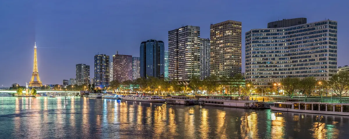The Eiffel Tower and the riverside towers of the 15th arrondissement at night
