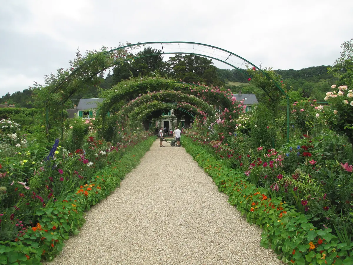 The flower-covered main path in Monet's garden at Giverny